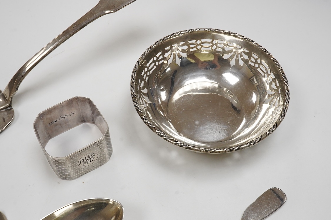 Eight assorted items of 19th century and later silver flatware including a Georgian silver fish slice(repair), various dates and makers, together with a Danish white metal spoon, a silver napkin ring and a small pierced